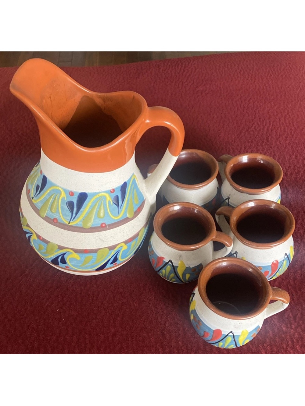 Handcrafted Ceramic Pitcher and Mug Set in Orange and Multicolor